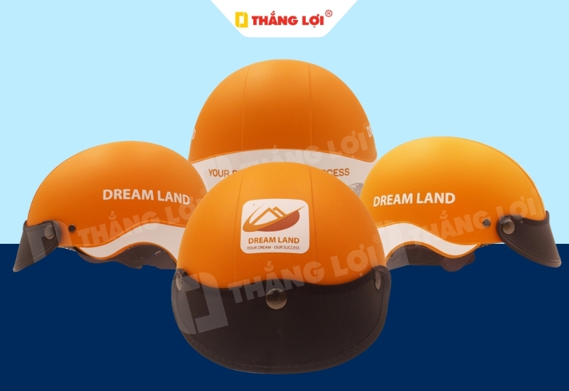 Nón bảo hiểm nửa đầu màu cam in logo thương hiệu bất động sản Dream Land
