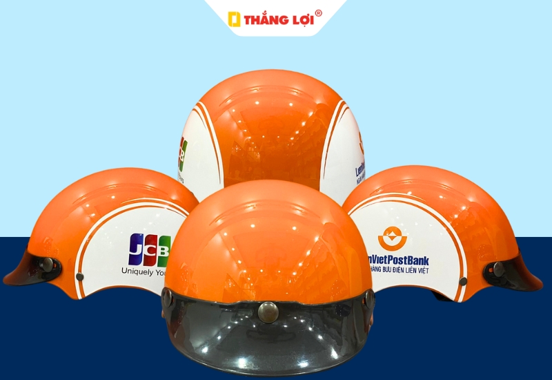 Nón bảo hiểm nửa đầu màu cam in logo thương hiệu thanh toán quốc tế JCB
