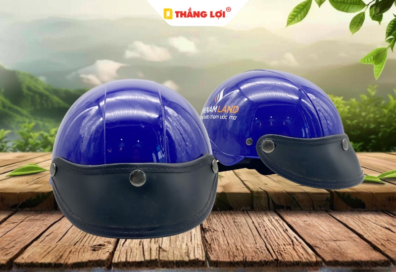 Mẫu nón bảo hiểm màu xanh in logo đơn vị Phi Nam Land